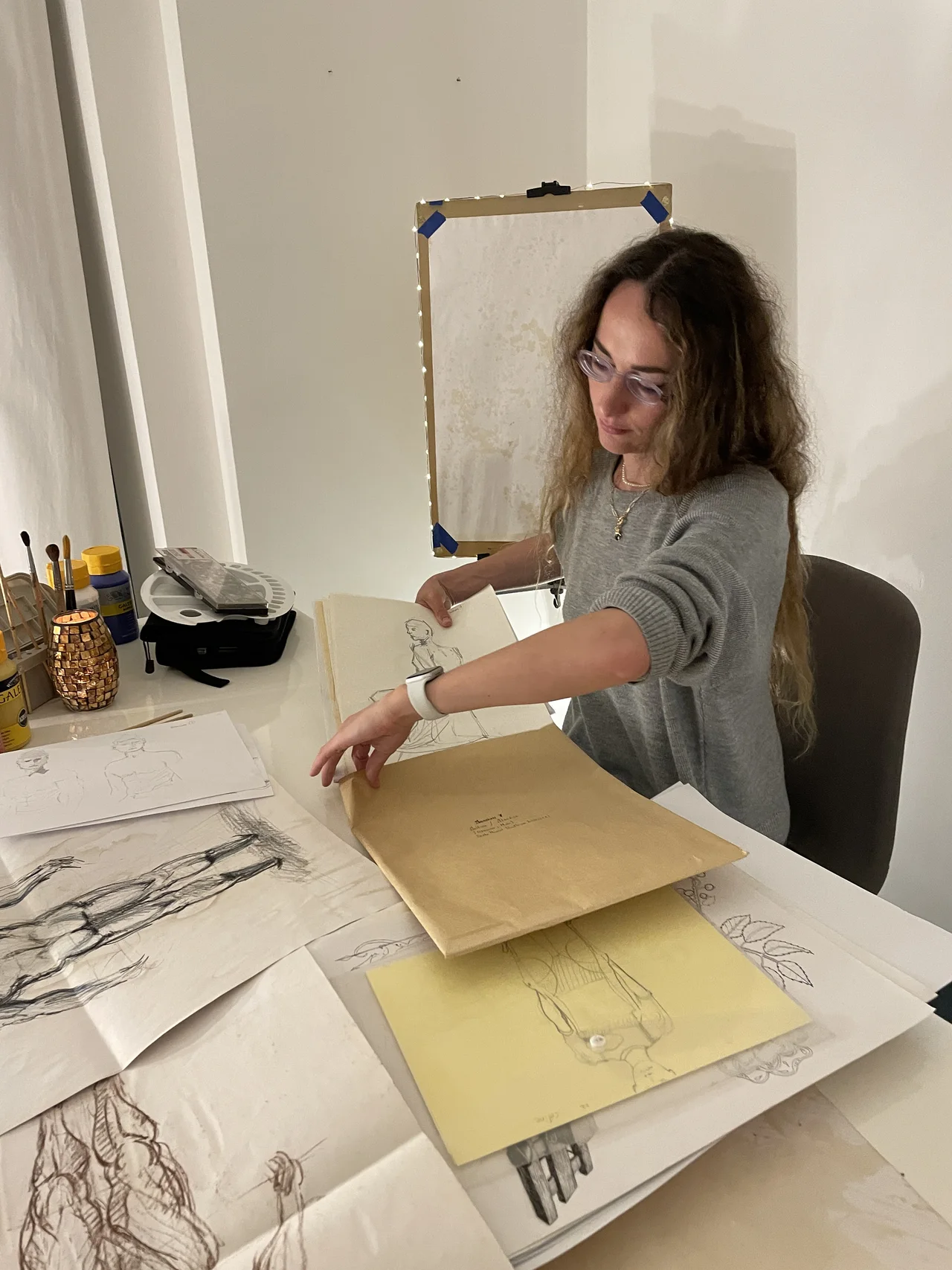 Sveta Dietrich working at her studio table